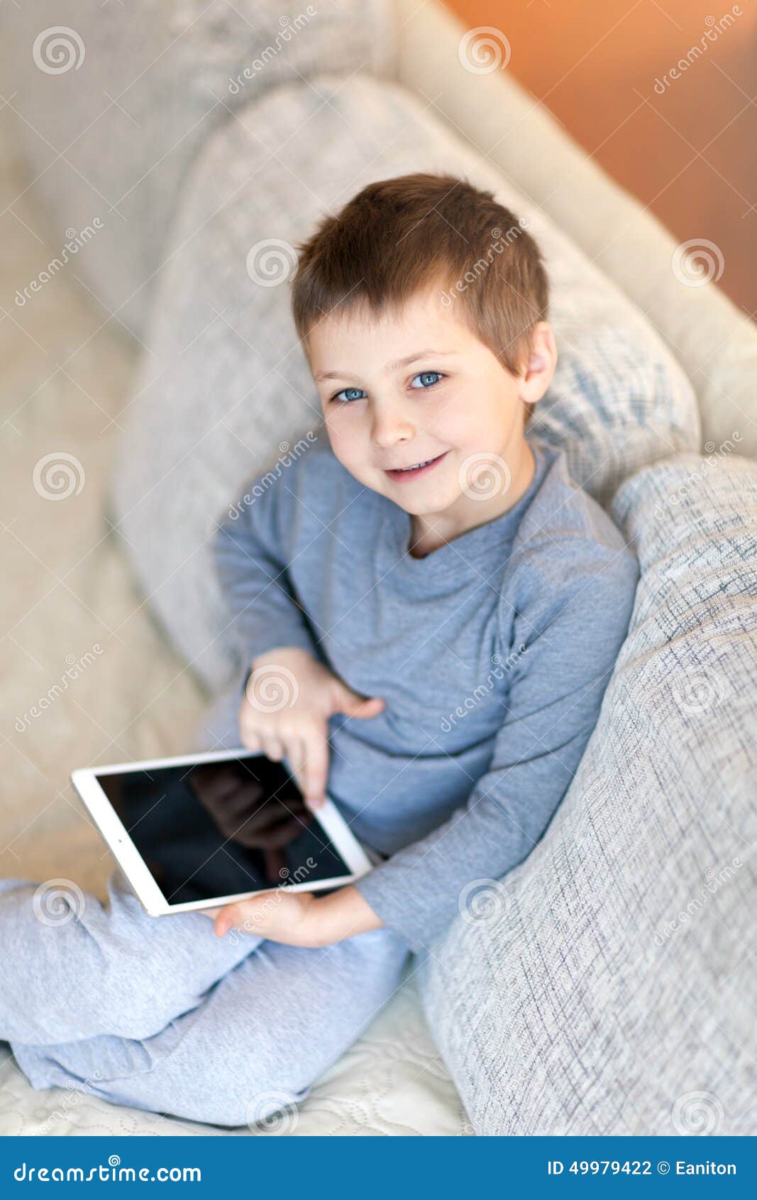 Boy with iPad stock photo. Image of sweet, pajamas, board - 49979422