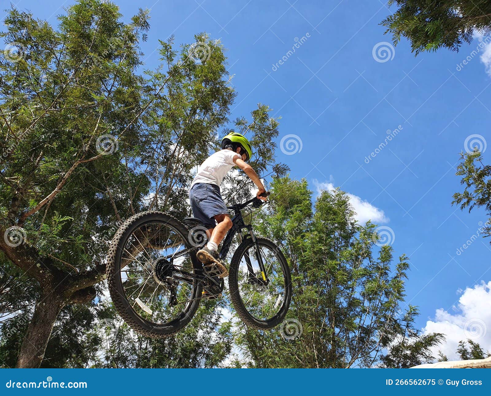 A Boy Jumping with His Mountain Bike Stock Image Image of trail, jump