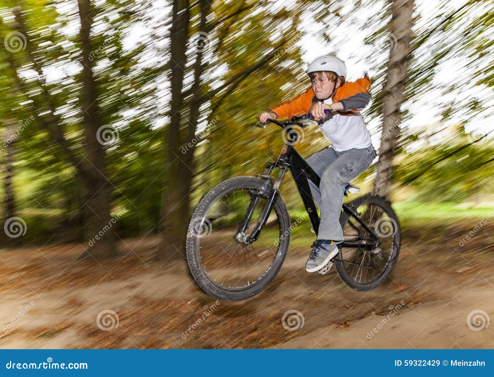 Boy jumping over a ramp stock image. Image of athletic - 59322429