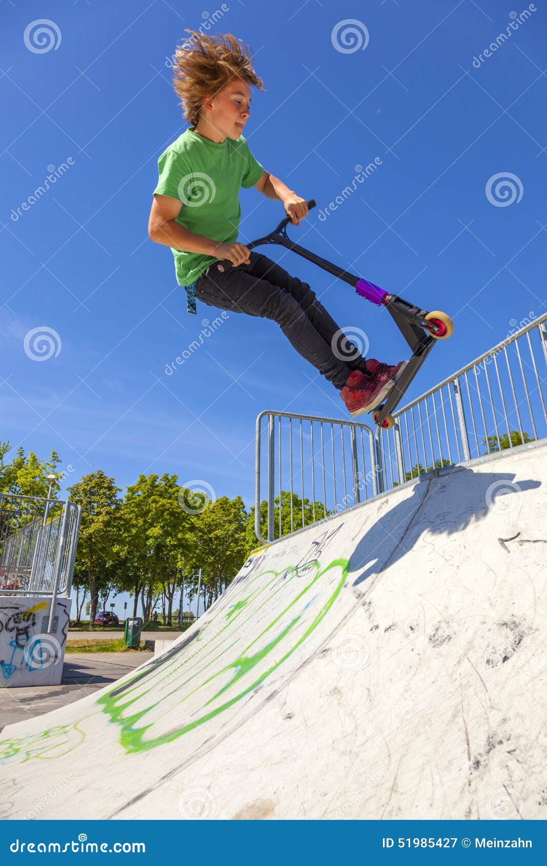 Boy Jumps with His Scooter at a Skate Park Stock Image Image of hair