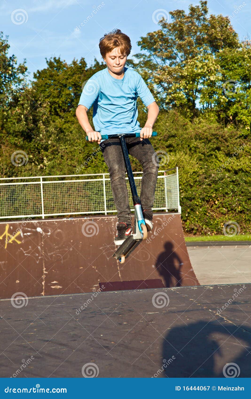 Boy Jumps with Scooter at the Skate Park Stock Image Image of hair