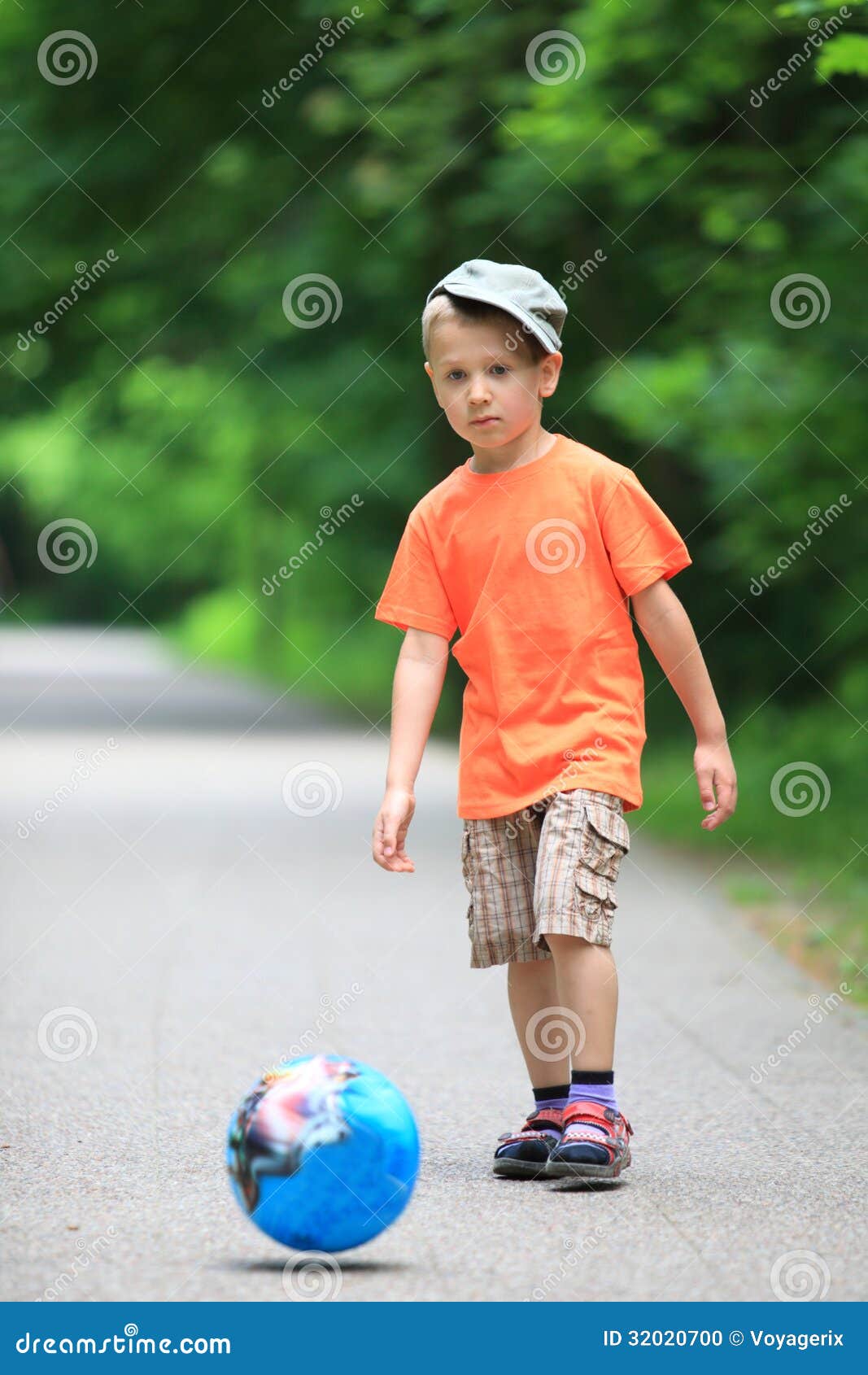 Boy Kicks the Ball in Park Outdoors Stock Photo Image of playing