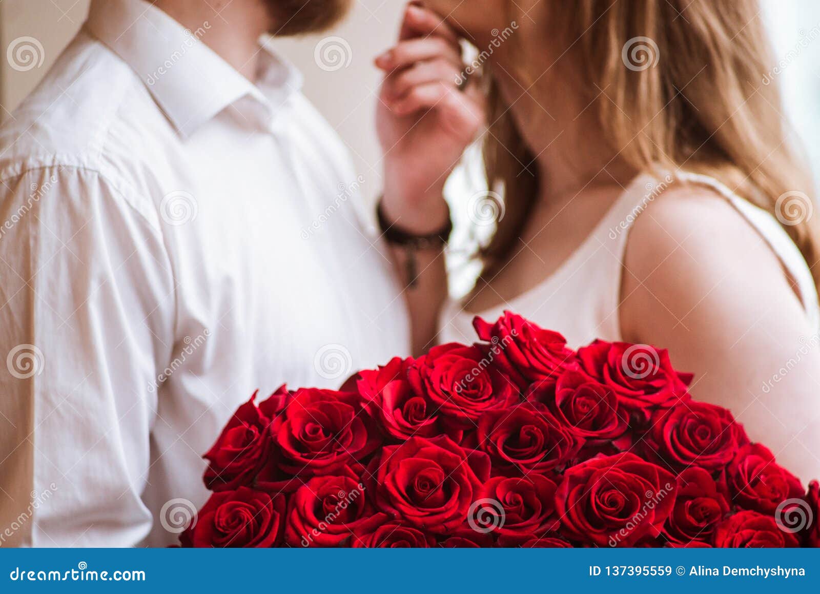 The Guy Gives the Girl a Big Bouquet of Roses 2 Stock Image ...