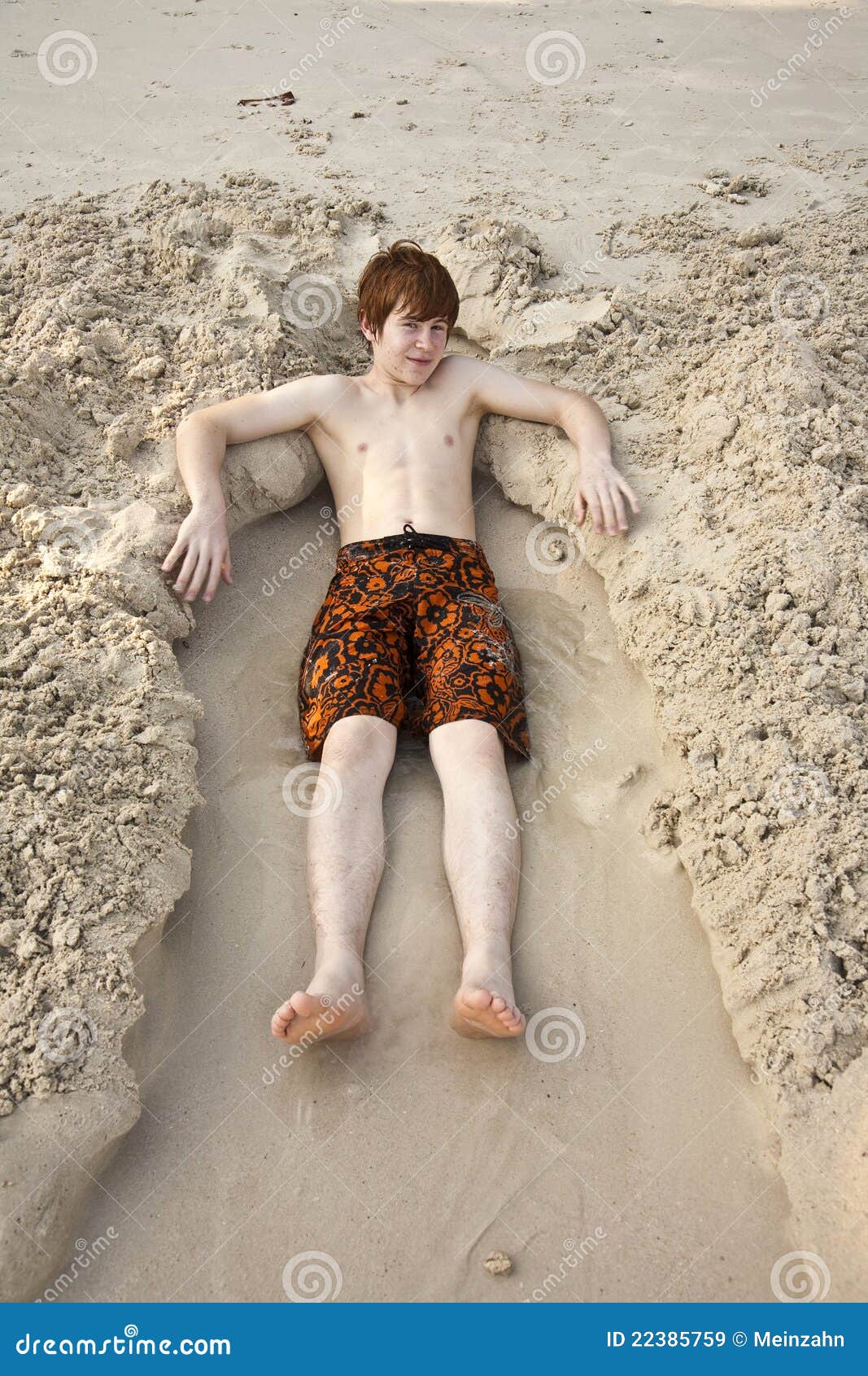 Boy is Lying in a Sandy Bed Stock Image Image of feet, cute 22385759