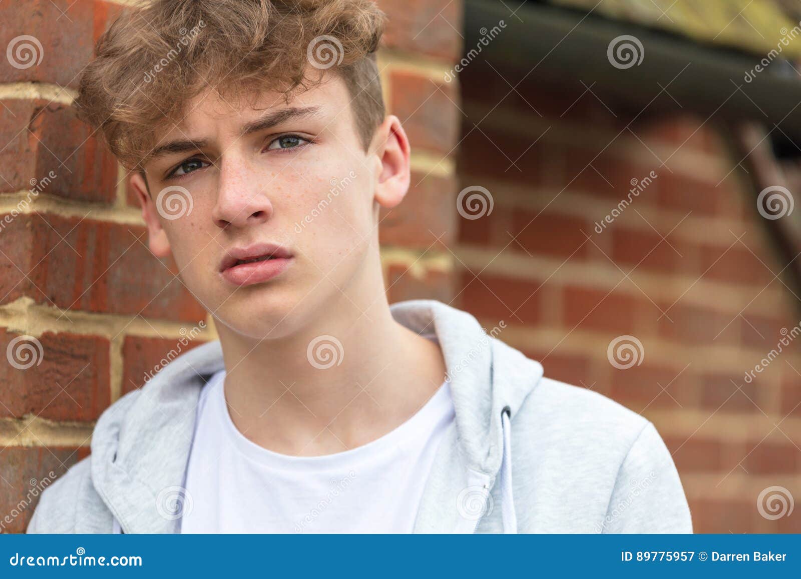 boy male child teenager wearing hoody