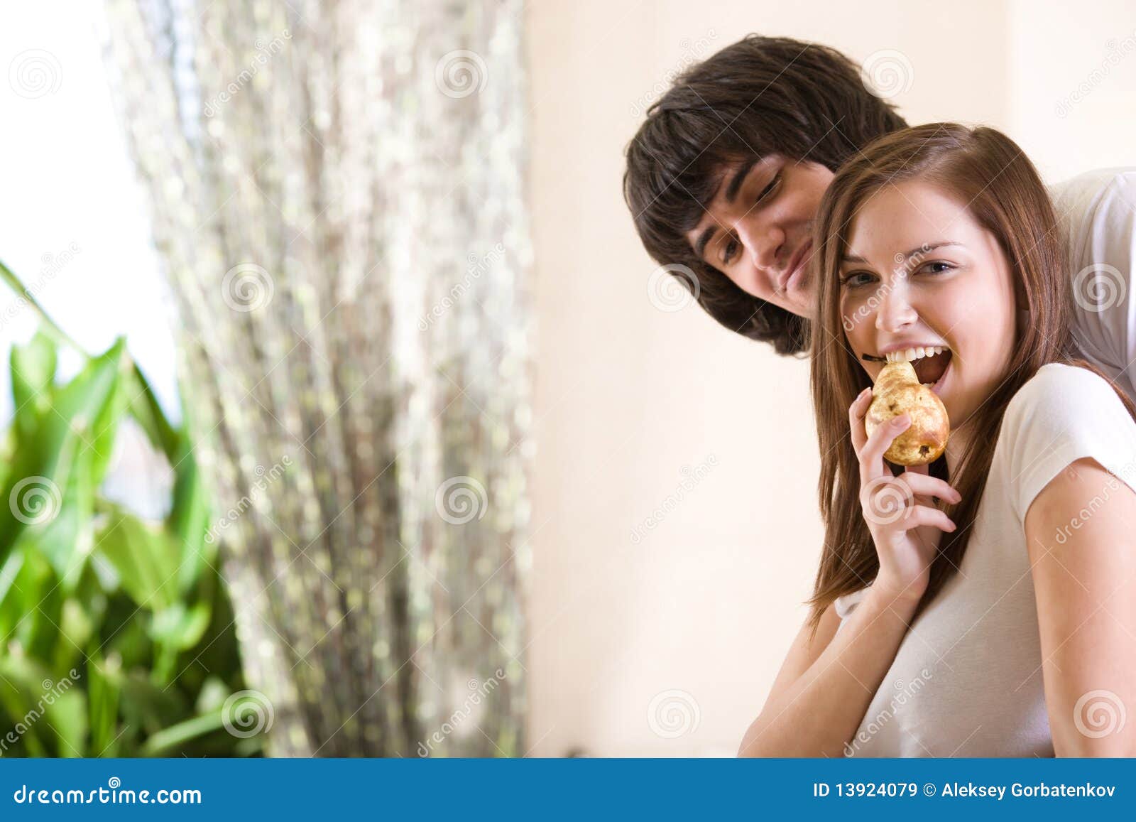 Boy and Nice Girl with Pear Stock Image Image of couple, affectionate