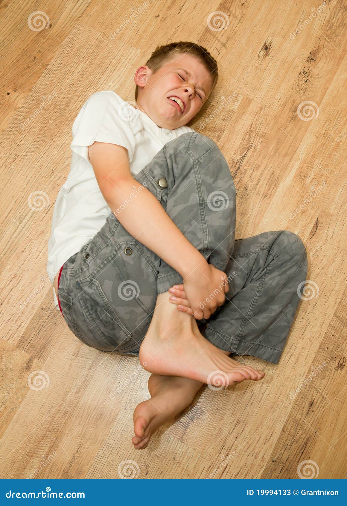 Boy in pain stock image. Image of injured, hurt, pain 19994133