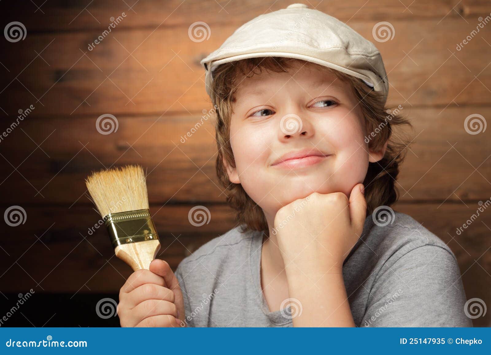 Boy with paint brush stock image. Image of decorating 25147935