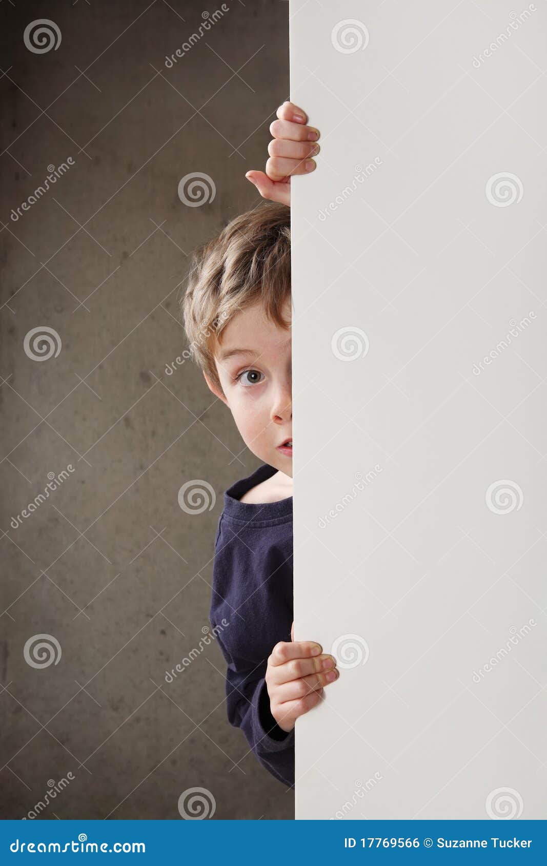 Child Peeking Around Corner
