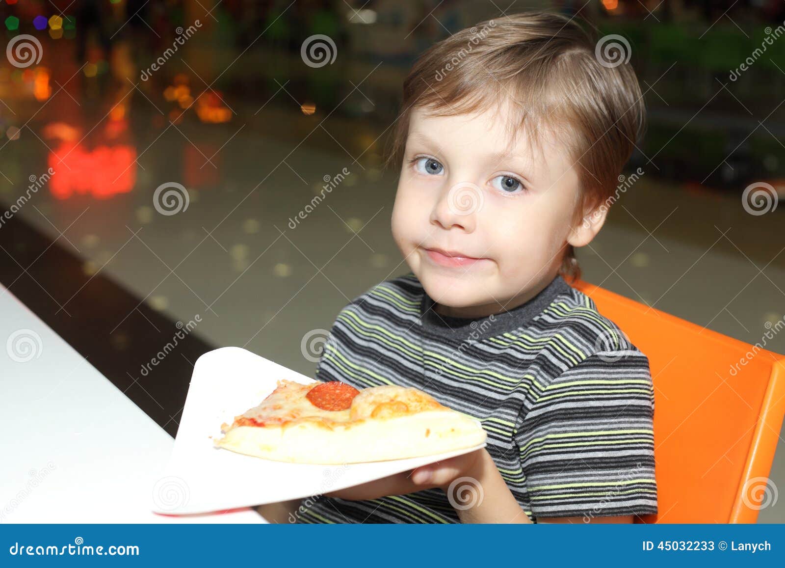 Boy and pizza stock image. Image of delicious, piece 45032233