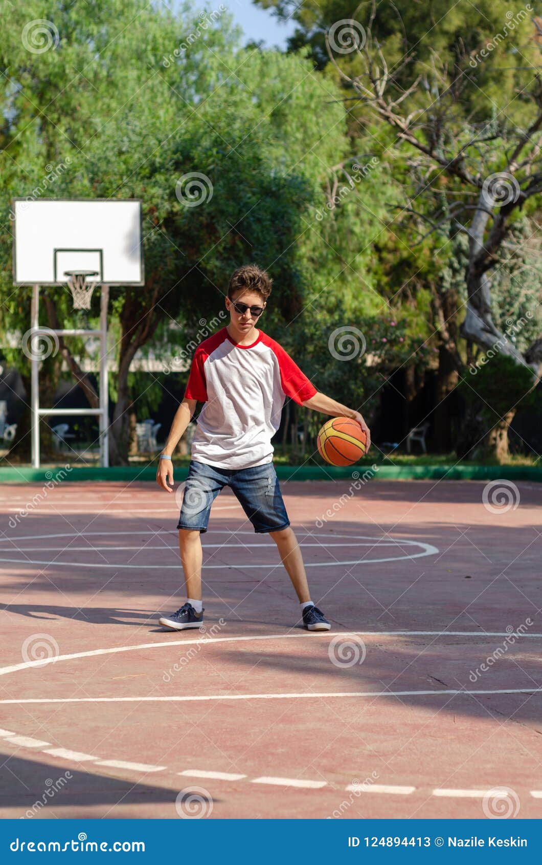 The Boy is Playing Basketball Alone Stock Image Image of shirt