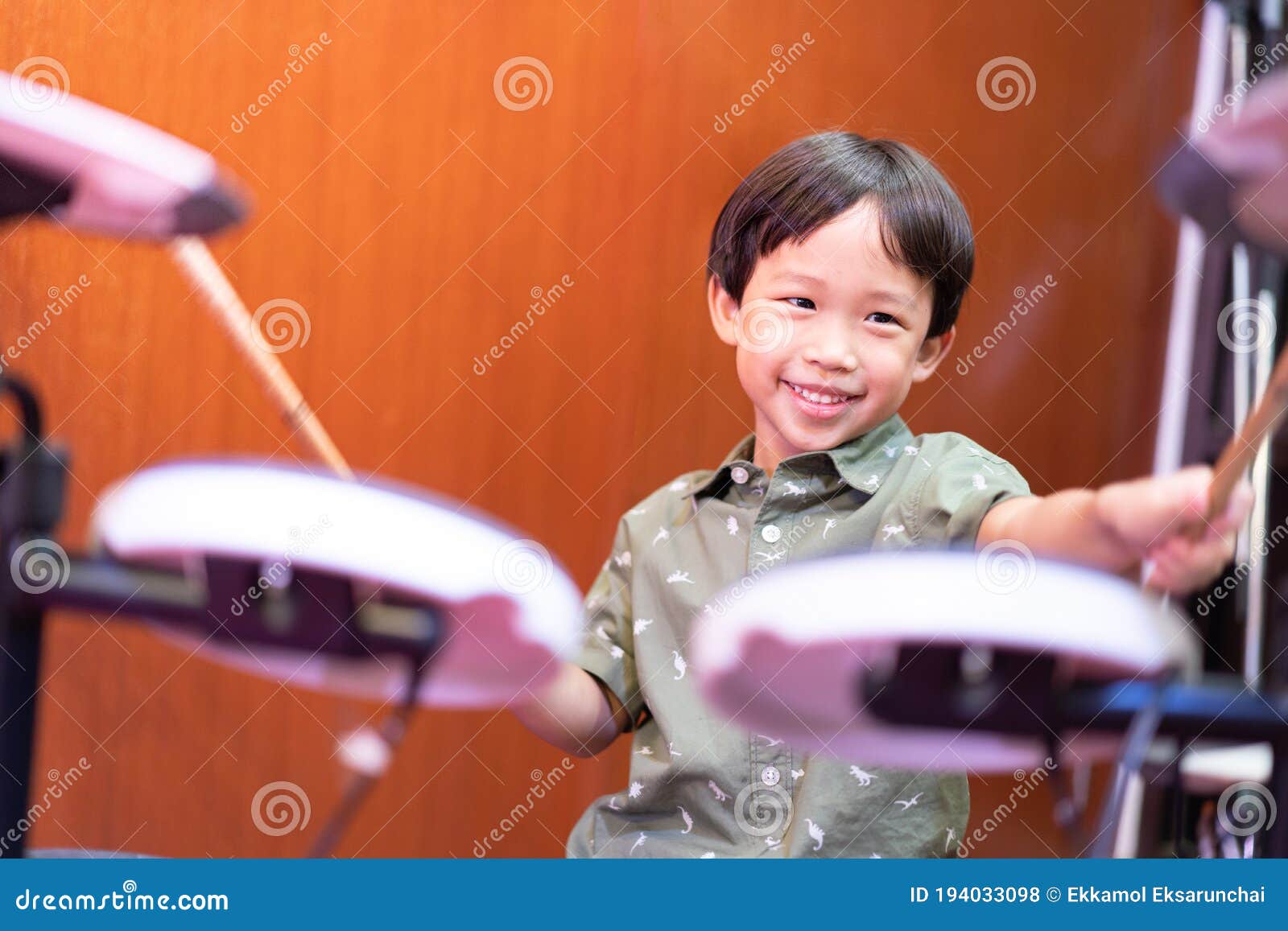 A Boy is Playing an Electronic Drum Stock Photo Image of entertainment, child 194033098