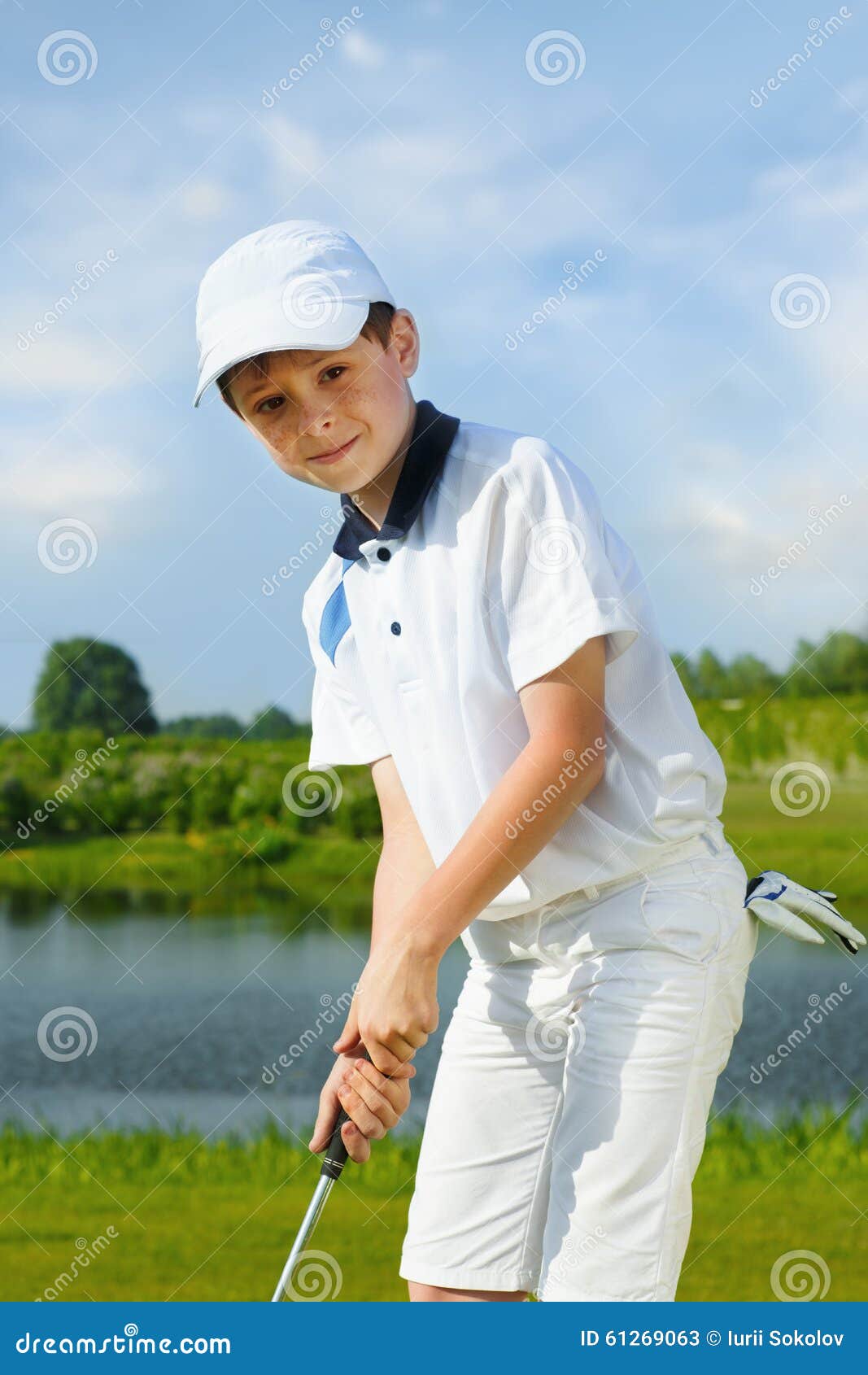 Boy playing golf stock image. Image of game, club, field 61269063