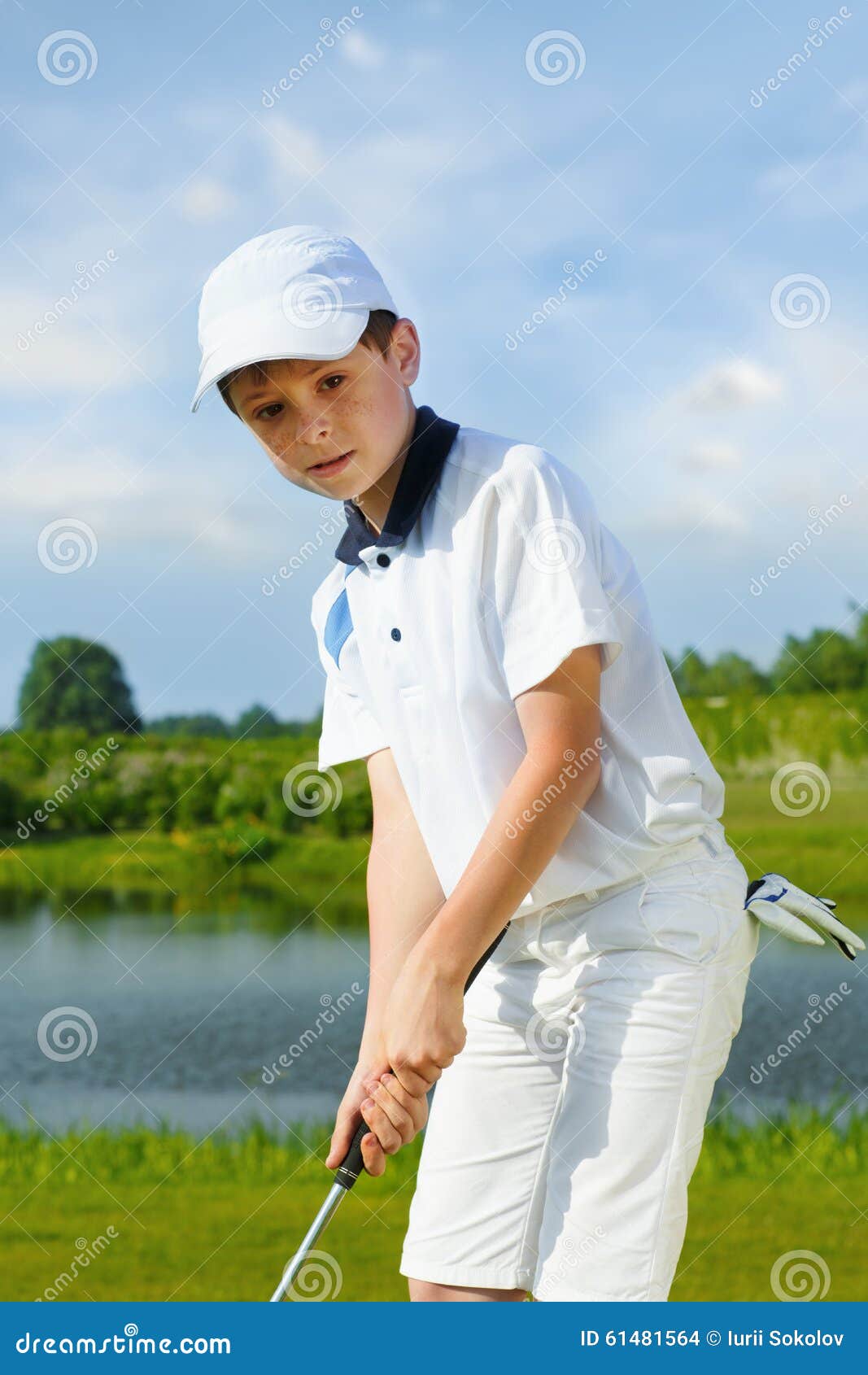 Boy playing golf stock photo. Image of accurate, golf 61481564