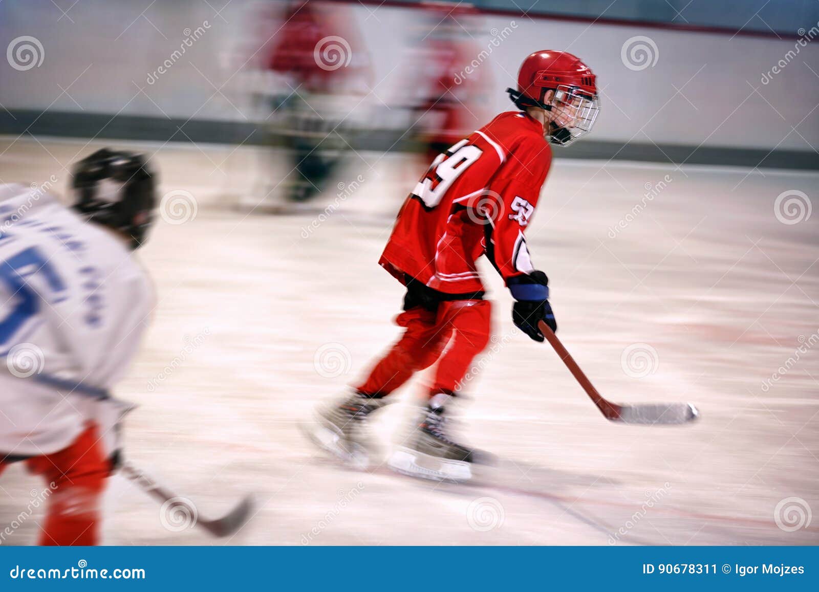 Boy Playing Ice Hockey on the Rink Stock Image Image of protective