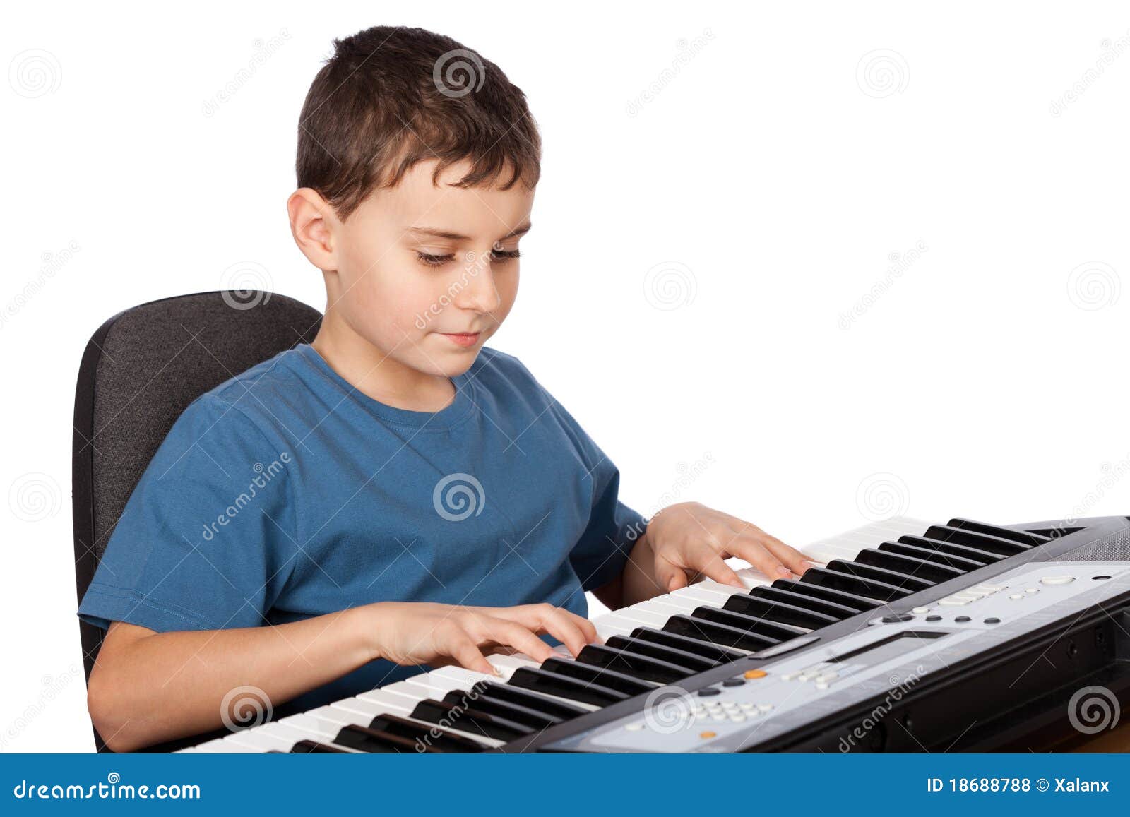 Boy playing piano stock photo. Image of loud, keys, performer - 18688788