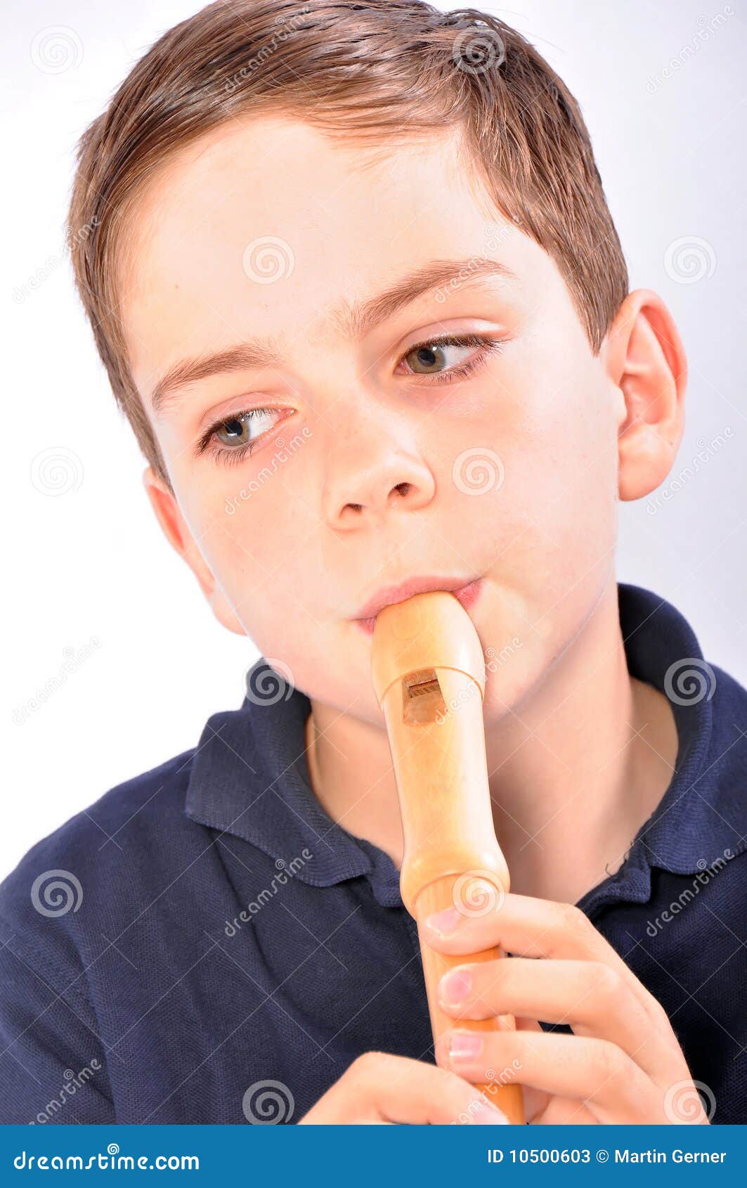 Boy playing recorder stock image. Image of music, young 10500603