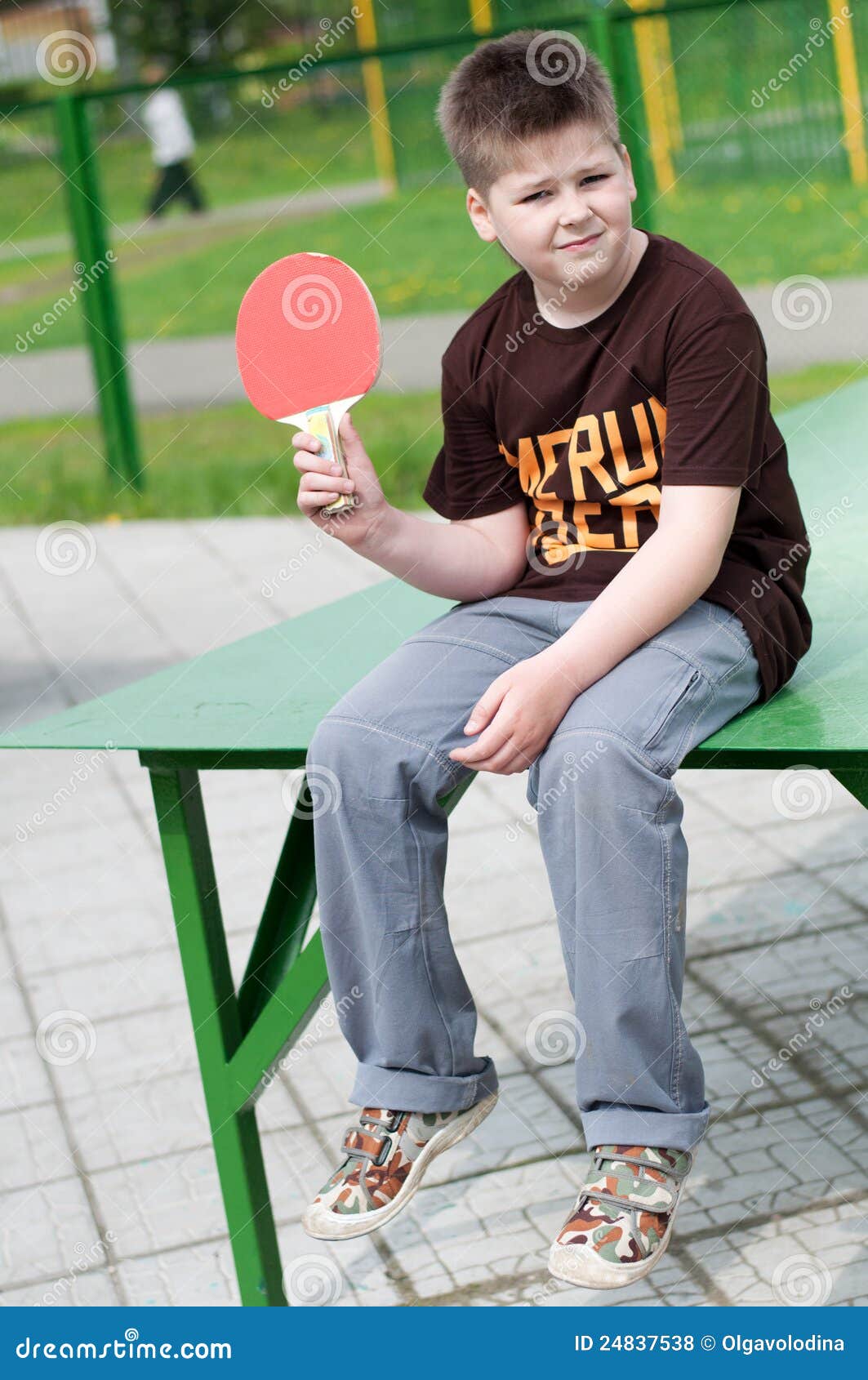 Boy playing table tennis stock photo. Image of action 24837538