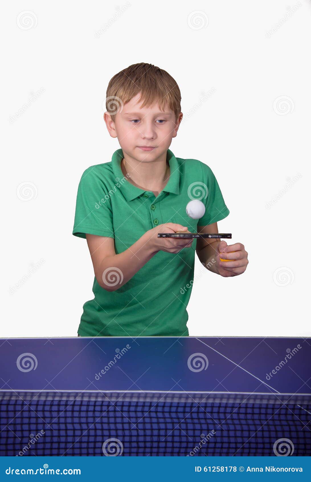 Boy playing table tennis stock photo. Image of action 61258178