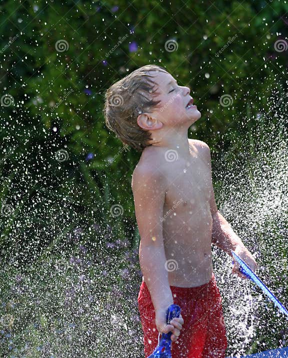 Boy Playing in Water Shower Stock Photo - Image of action, five: 8269854