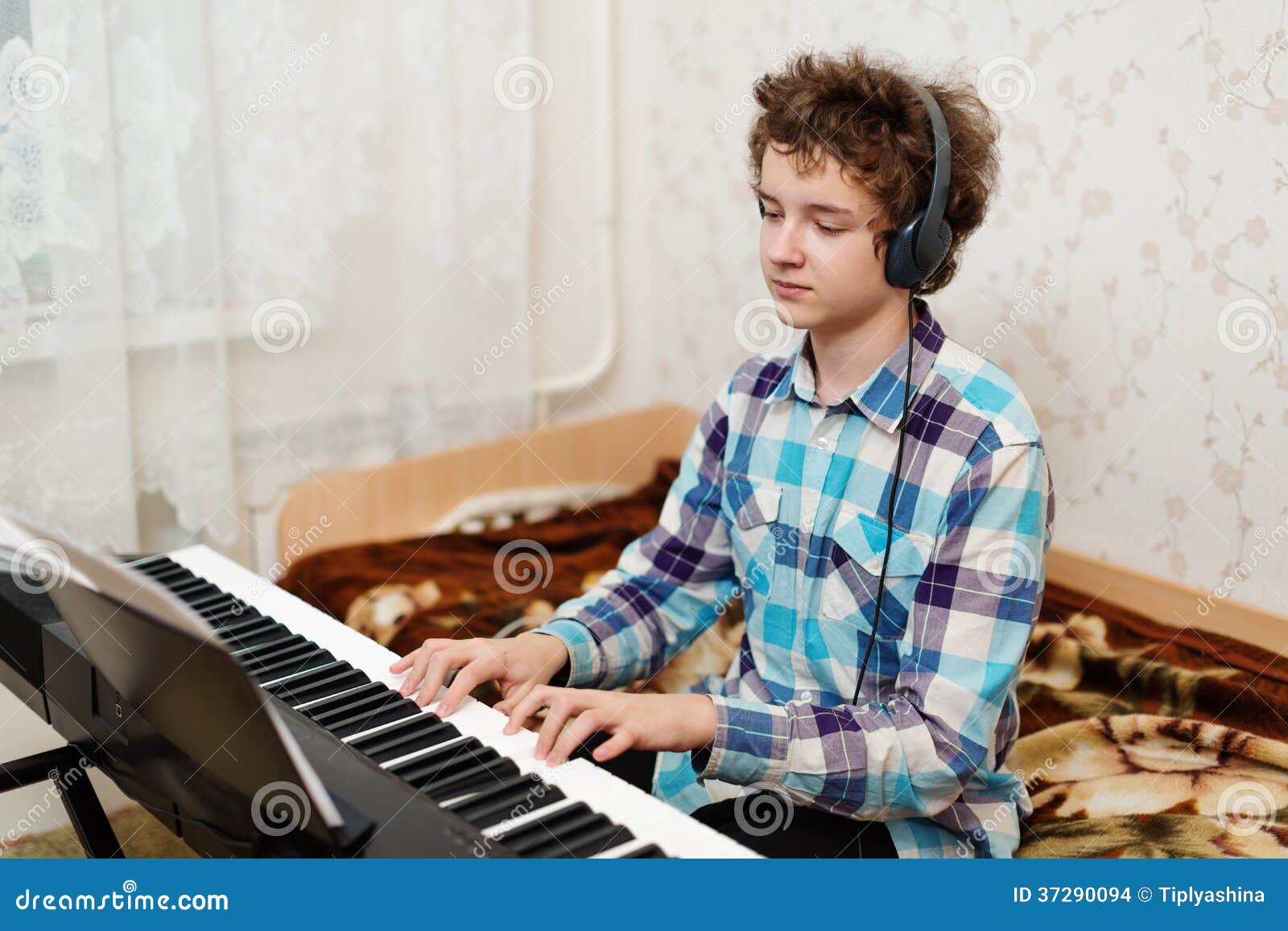 Boy plays piano stock photo. Image of hobby, equipment - 37290094