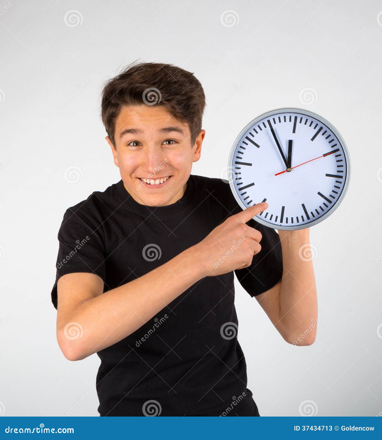 Boy pointing at clock stock image. Image of face, friendly 37434713