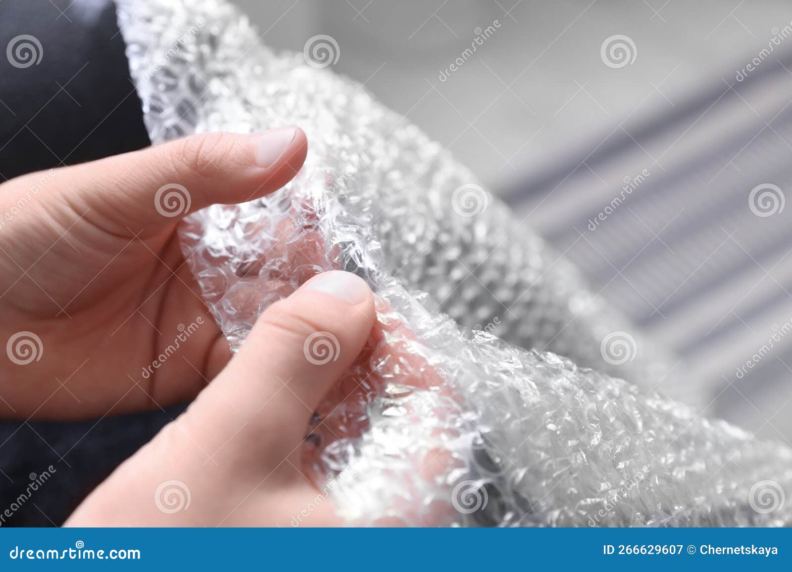 Boy Popping Bubble Wrap, Closeup. Stress Relief Stock Image - Image of
