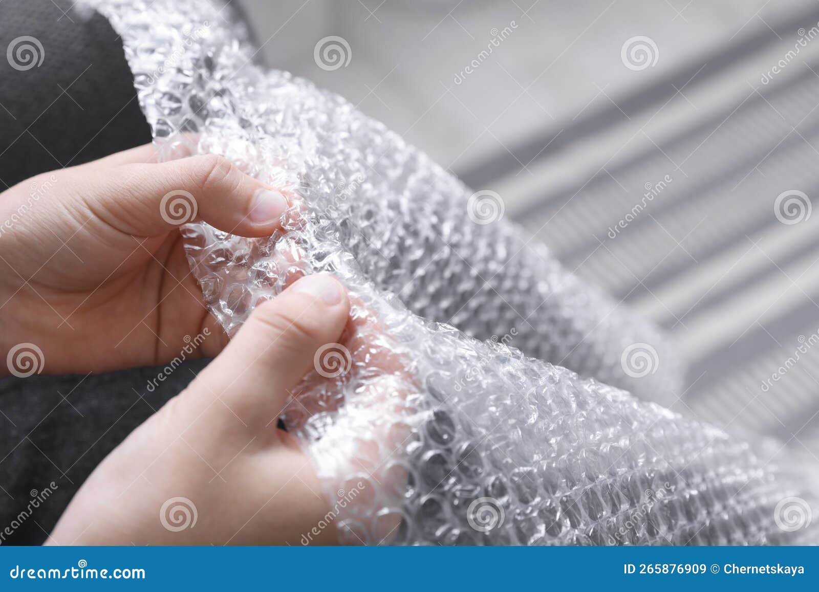 Boy Popping Bubble Wrap, Closeup. Stress Relief Stock Image - Image of