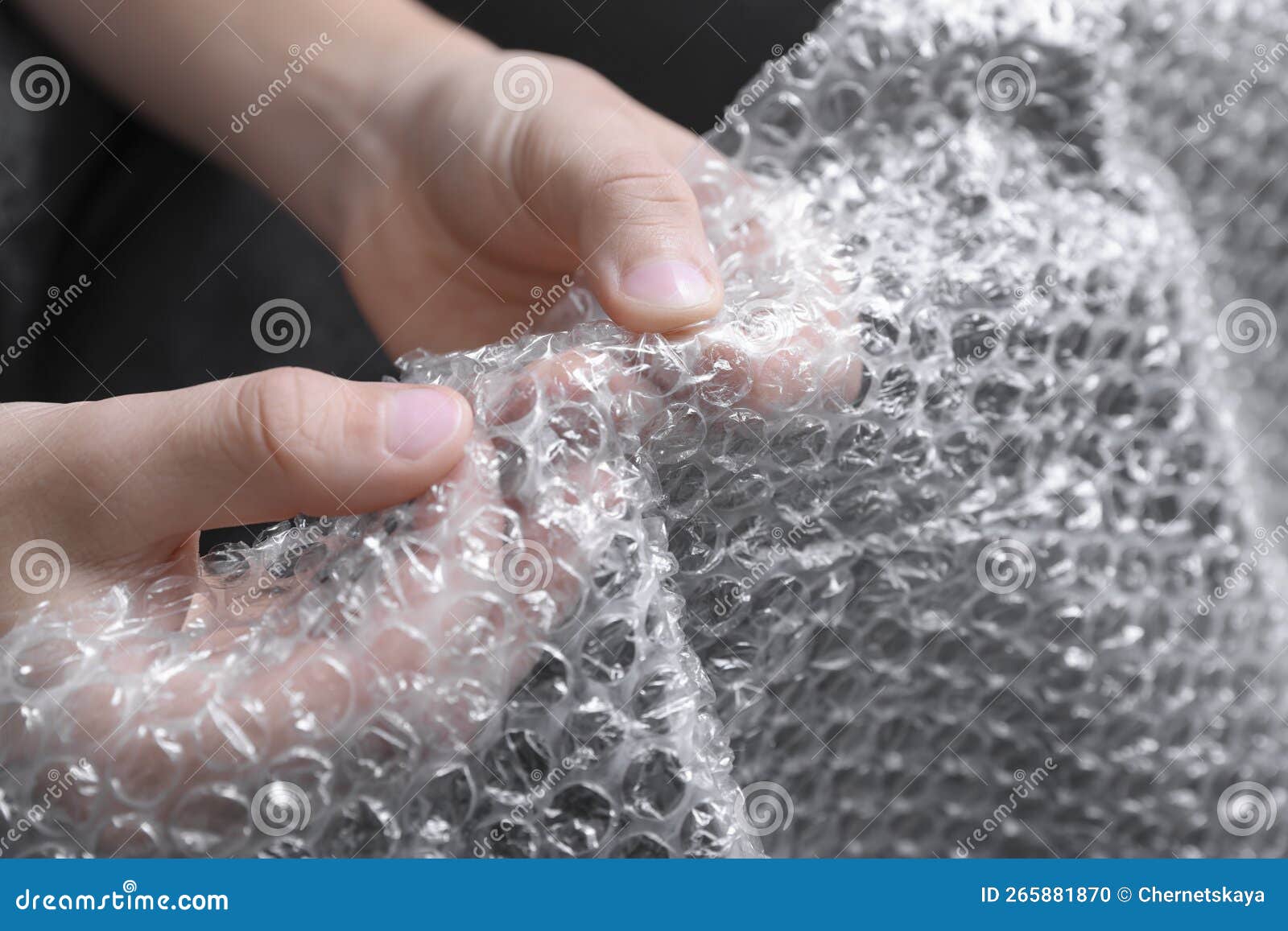Boy Popping Bubble Wrap, Closeup. Stress Relief Stock Photo - Image of