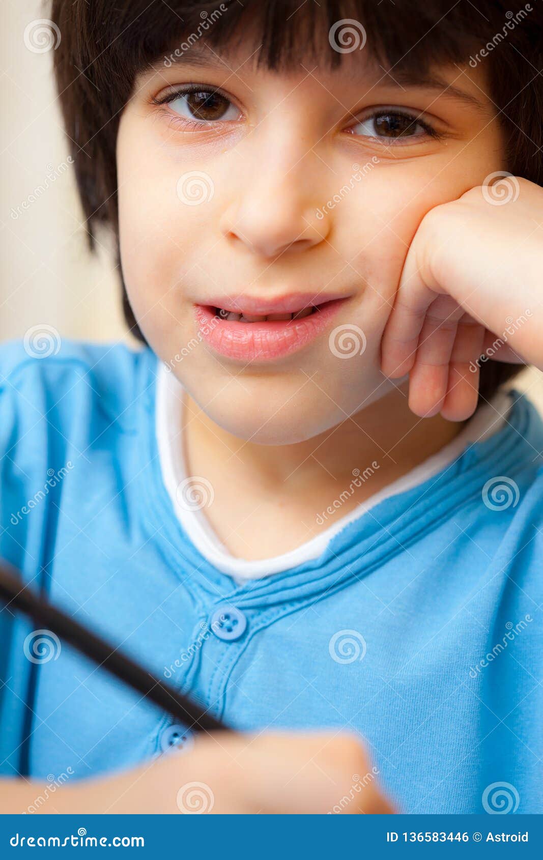 Boy portrait with pen stock photo. Image of looking 136583446