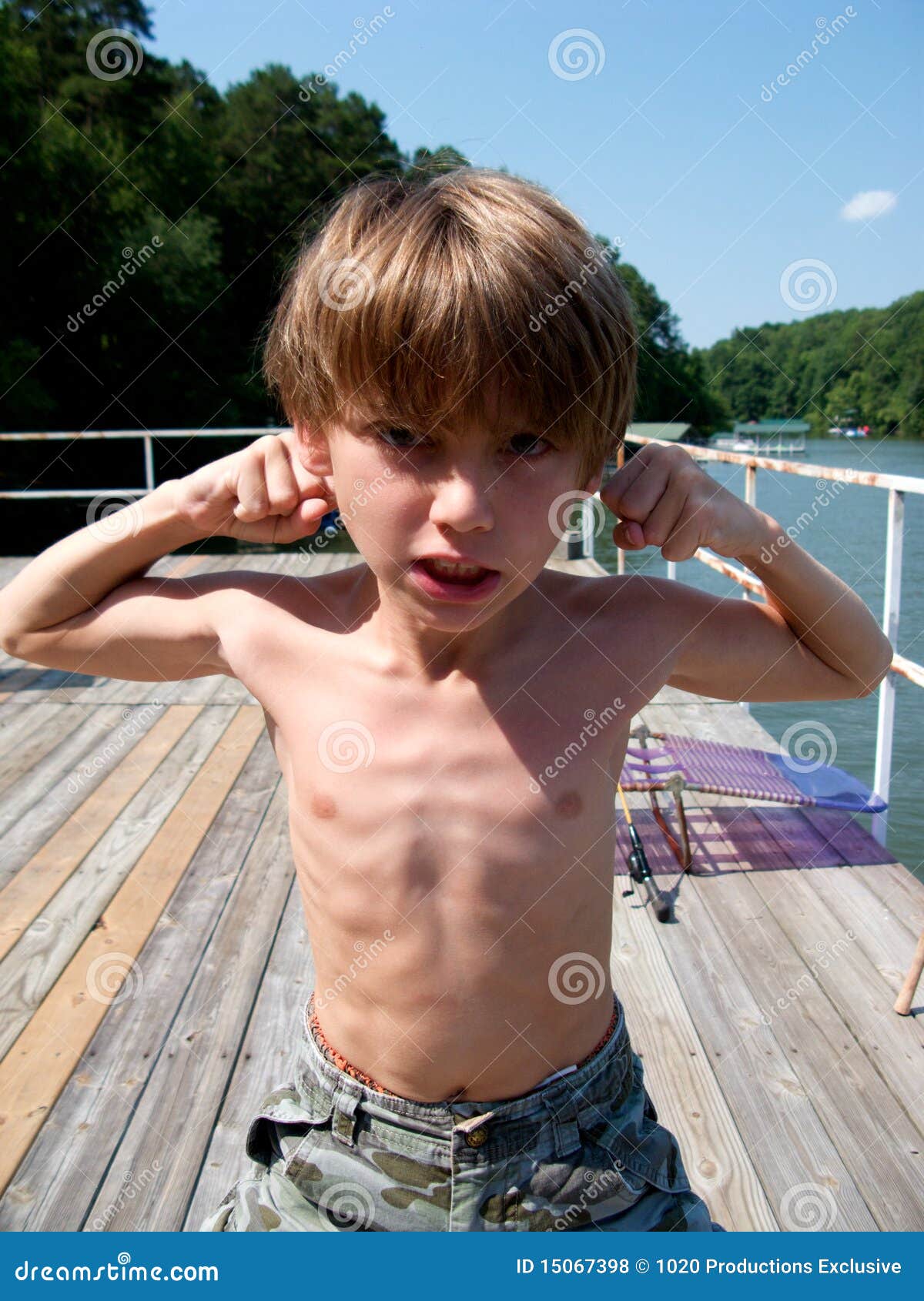Boy pulling funny face stock photo. Image of single, child - 15067398