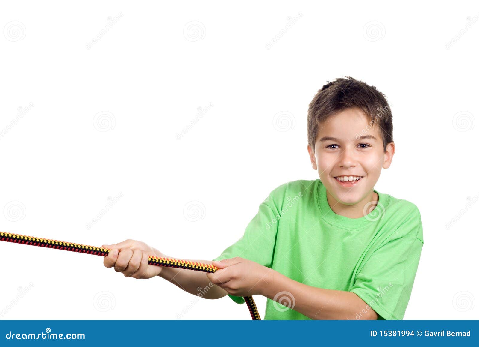 Boy pulling a rope stock photo. Image of pulling, sport 15381994