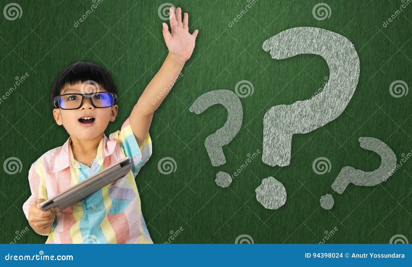 boy raise his hand to ask question
