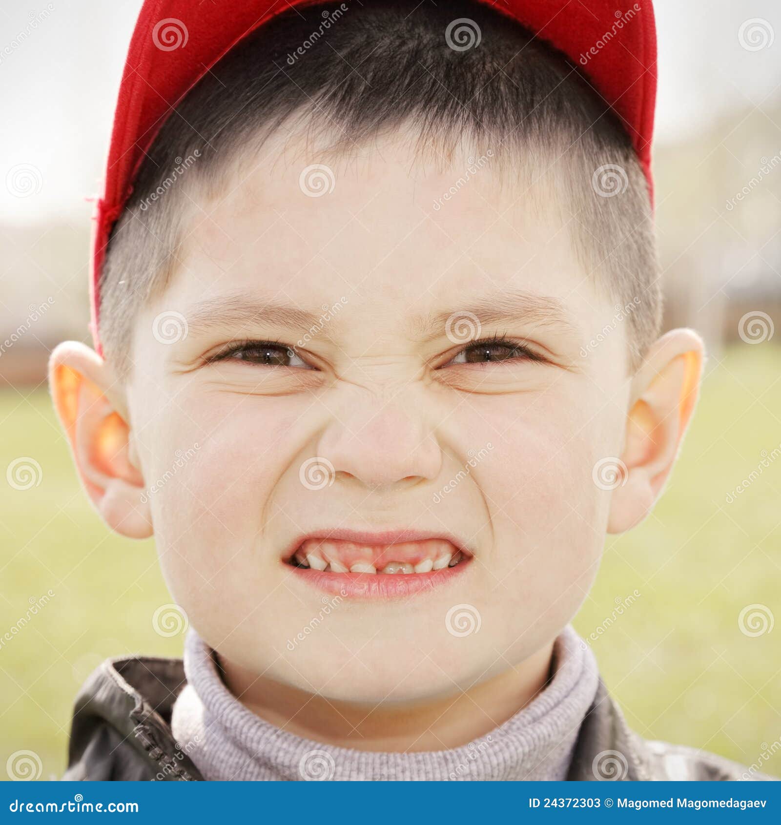 Boy in red cap stock image. Image of positive, closeup 24372303