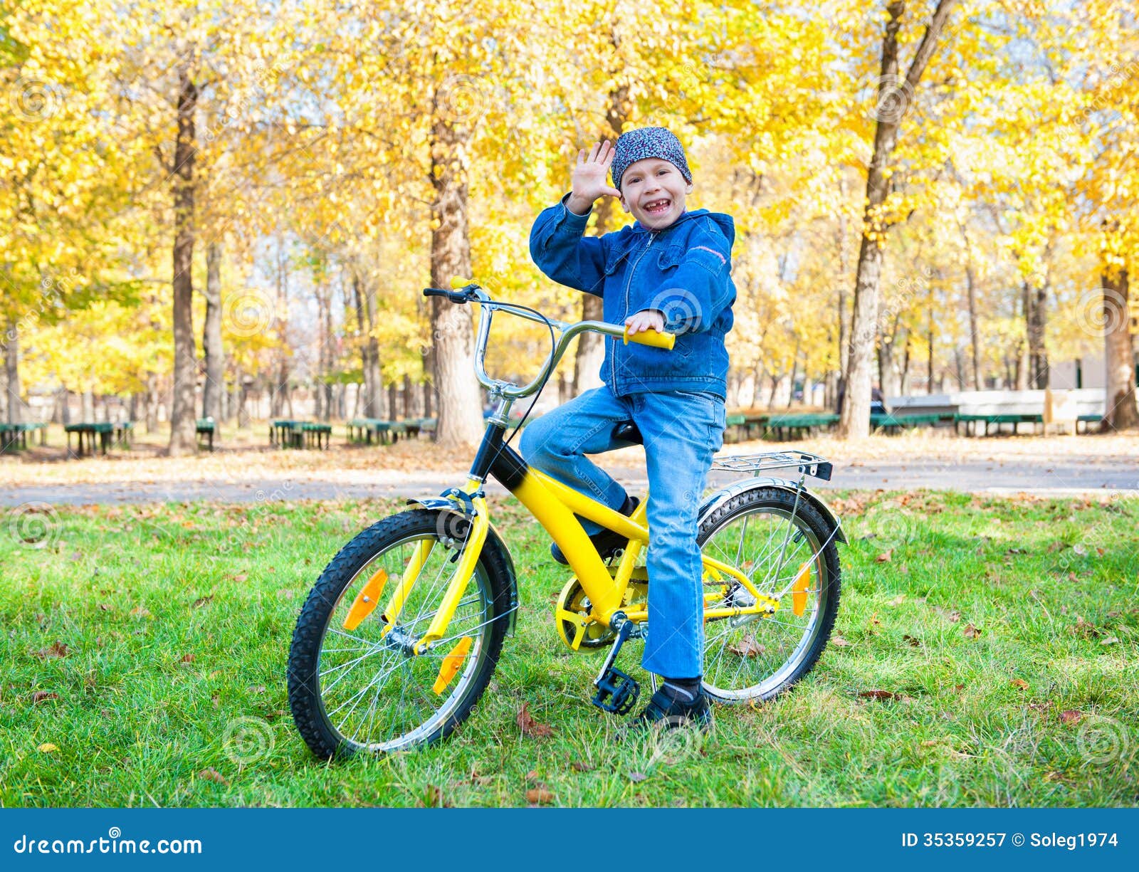 Boy Rides a Bicycle in Park Stock Image Image of blue, bicycle 35359257