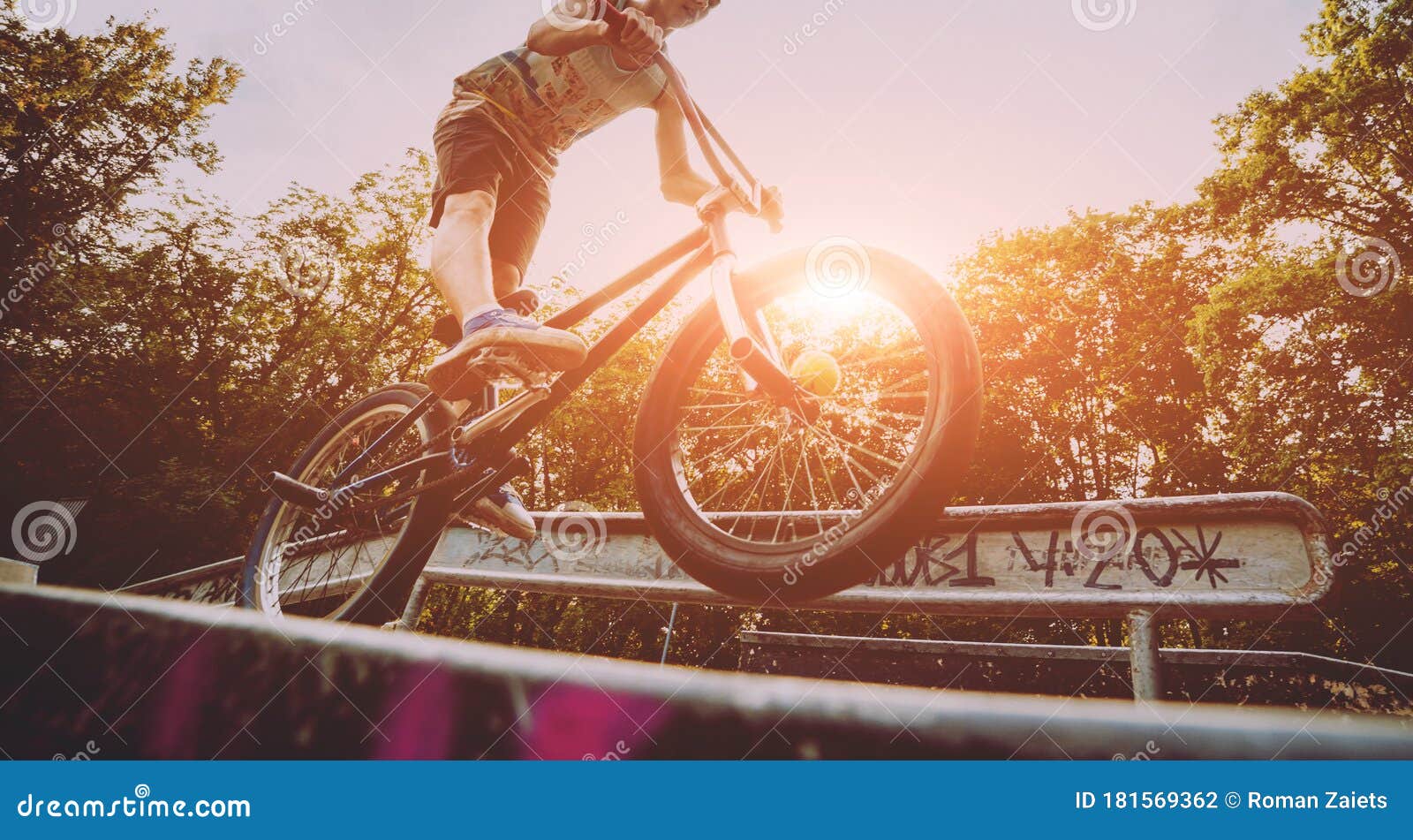 Boy Riding a Bmx in a Park. Stock Photo Image of activity, race