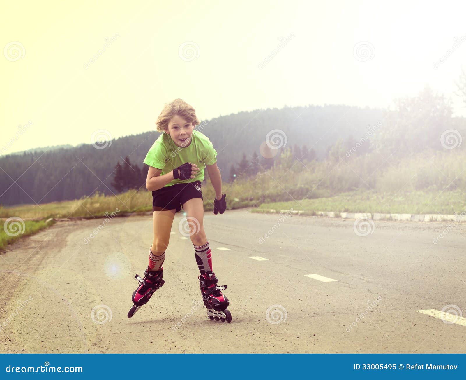 Boy Riding on Rollers on the Road Stock Image Image of blades