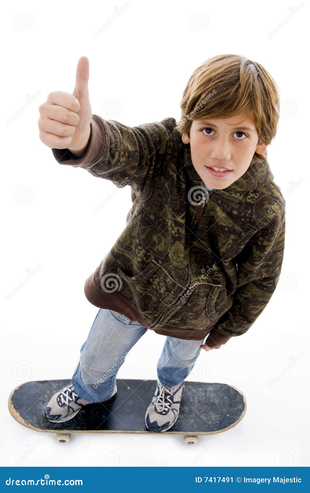 Boy Riding Skateboard and Showing Thumbs Up Stock Image Image of