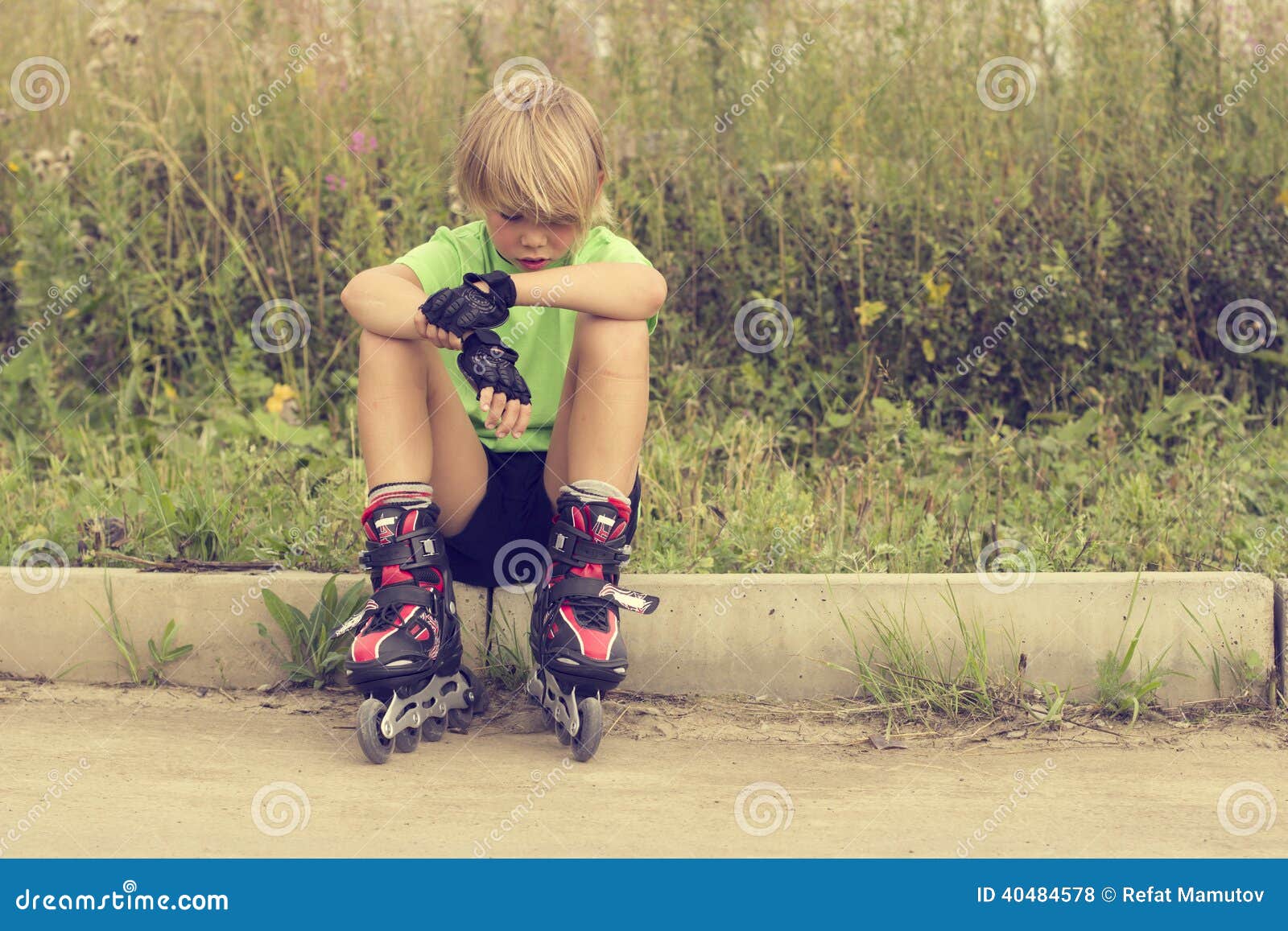 Boy on roller skates stock photo. Image of blonde, vacation 40484578