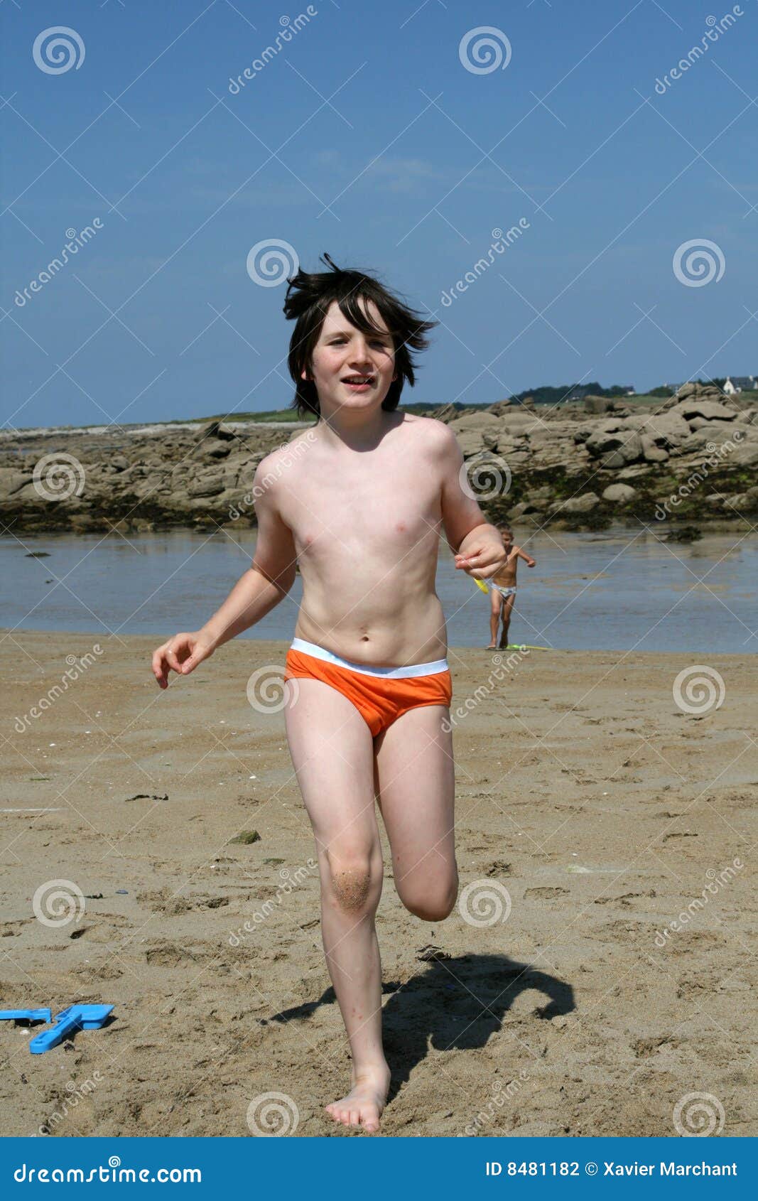 Boy running on beach stock photo Image of shell eyes Boy running on beach stock photo Image of shell eyes