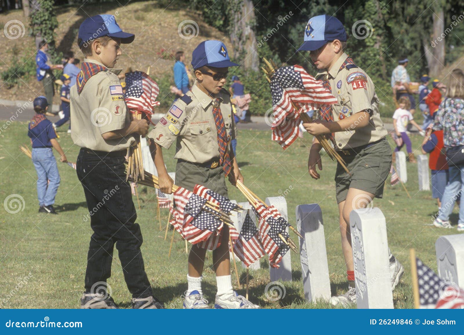 Boy Scouts placing flags editorial photo. Image of boys 26249846