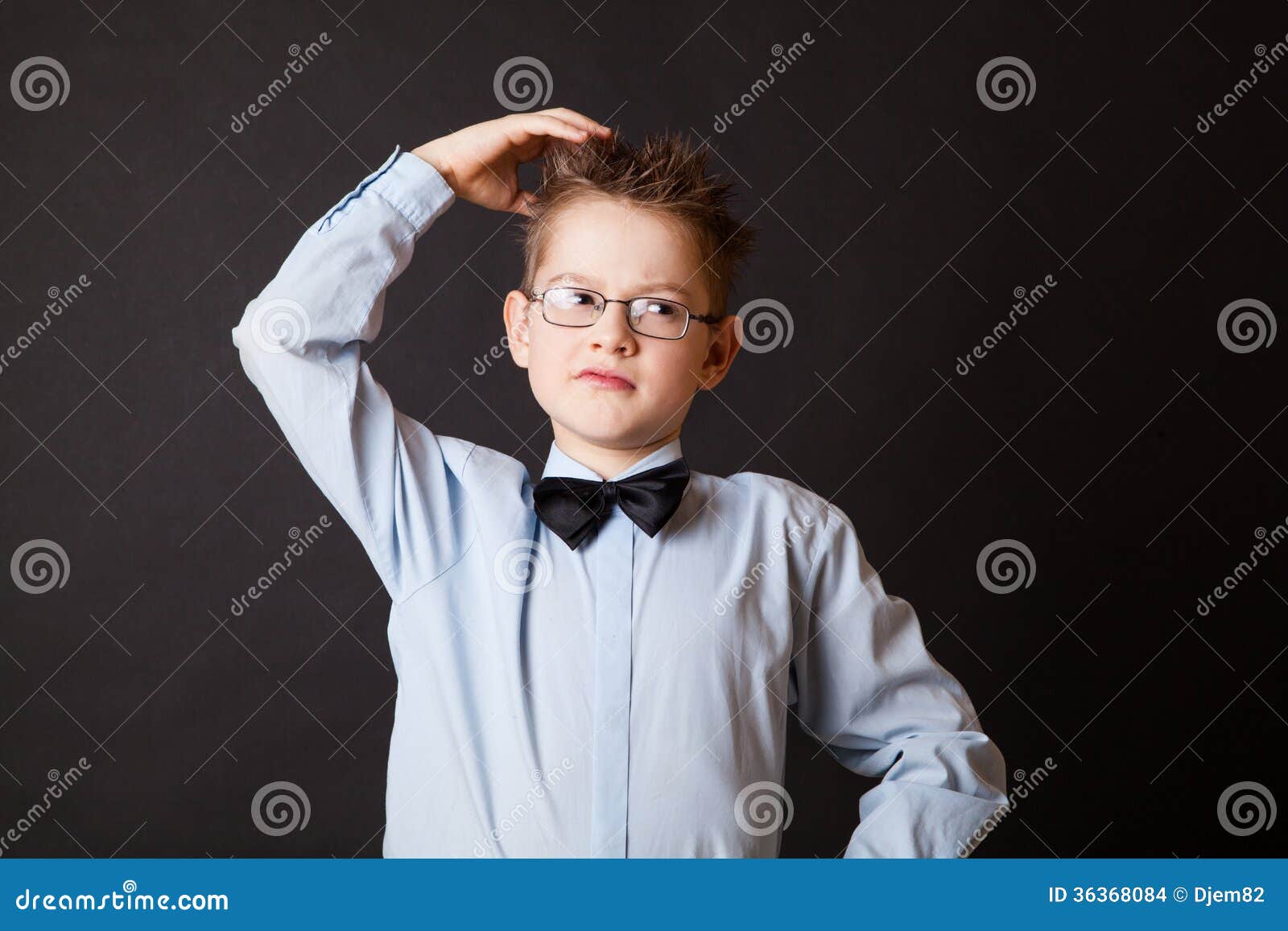 Boy Scratching His Head Thinking Stock Photo - Image of child, hair