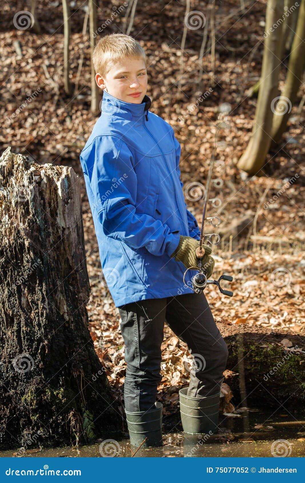 Boy in Shallow Pond Fishing with Rod Stock Photo - Image of blue ...