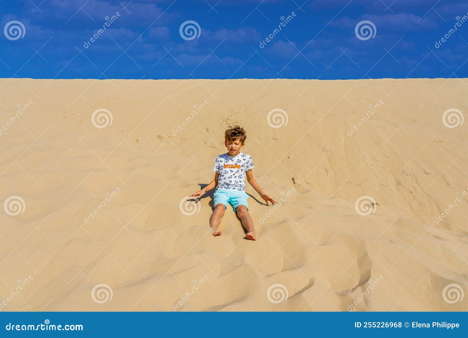Boy Sitting on a Huge Sand Dune, Famous Tourist Destination Dune Pyla ...