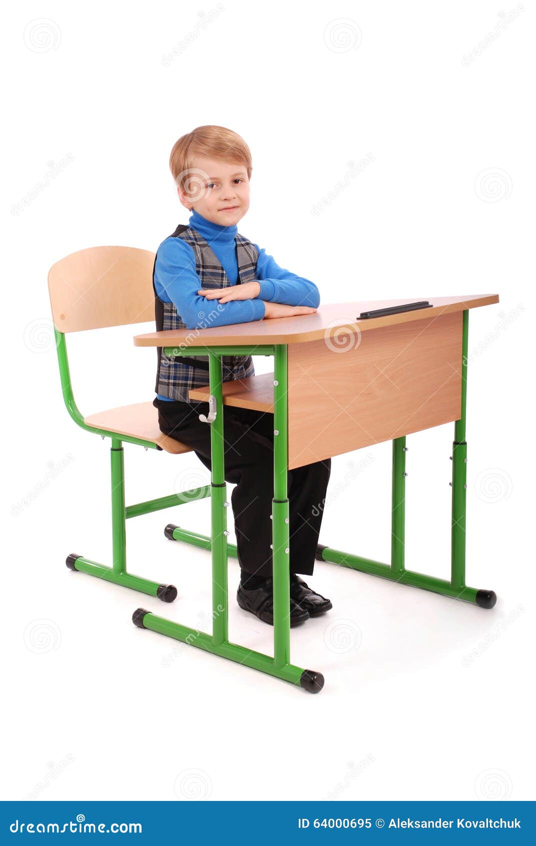 Boy Sitting at a School Desk Stock Image Image of people, book 64000695