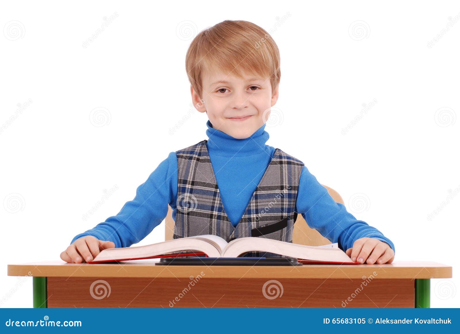 photo Boy Sitting At Desk dreamstime com