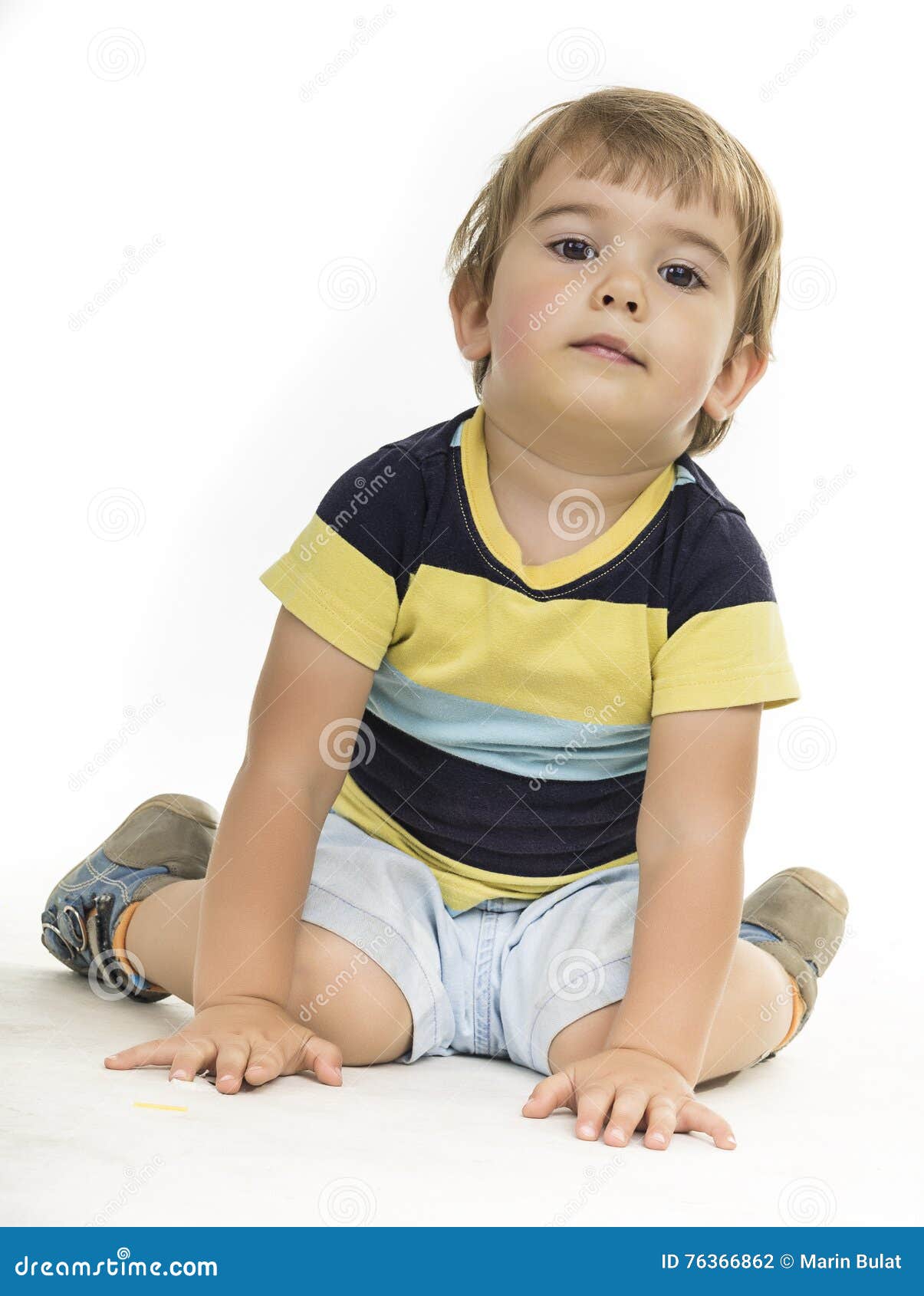 Boy sitting still stock photo. Image of white, quiet - 76366862
