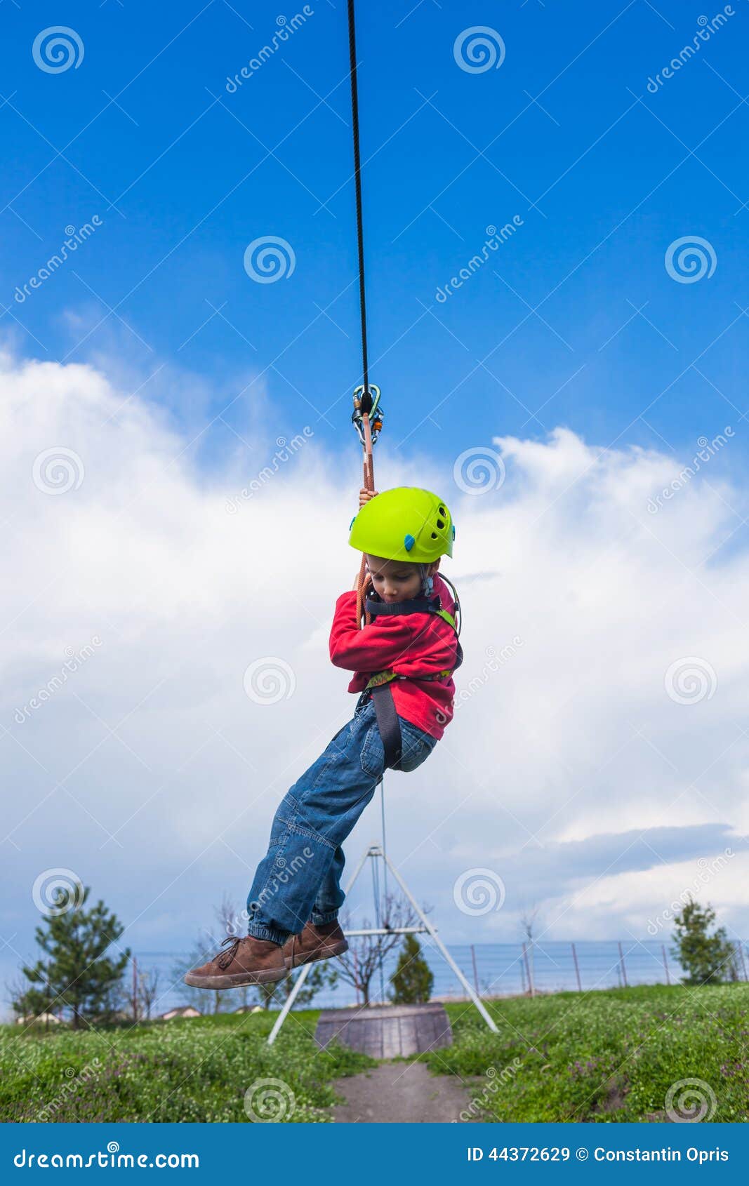 Boy sliding on zip line stock image. Image of cable, climber 44372629