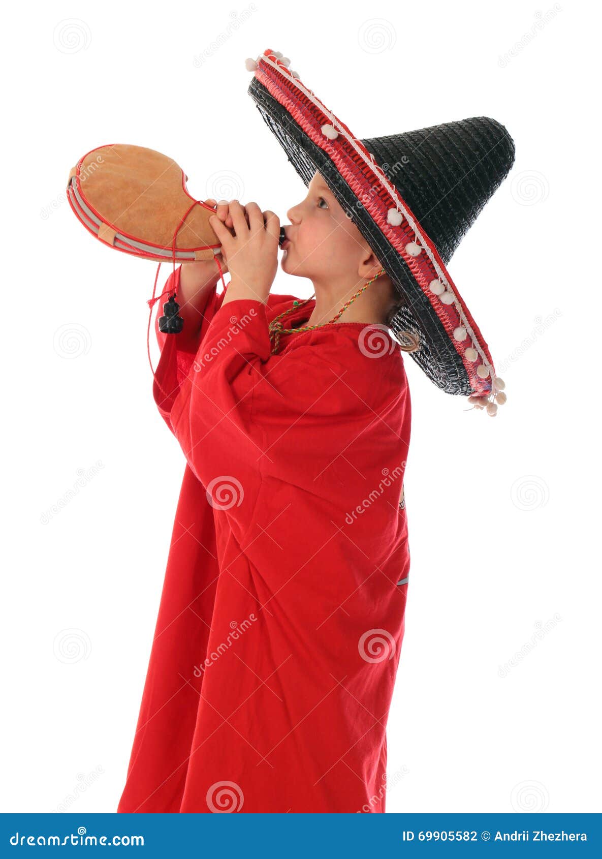 boy in spanish red shirt and sombrero drinking from bota bag