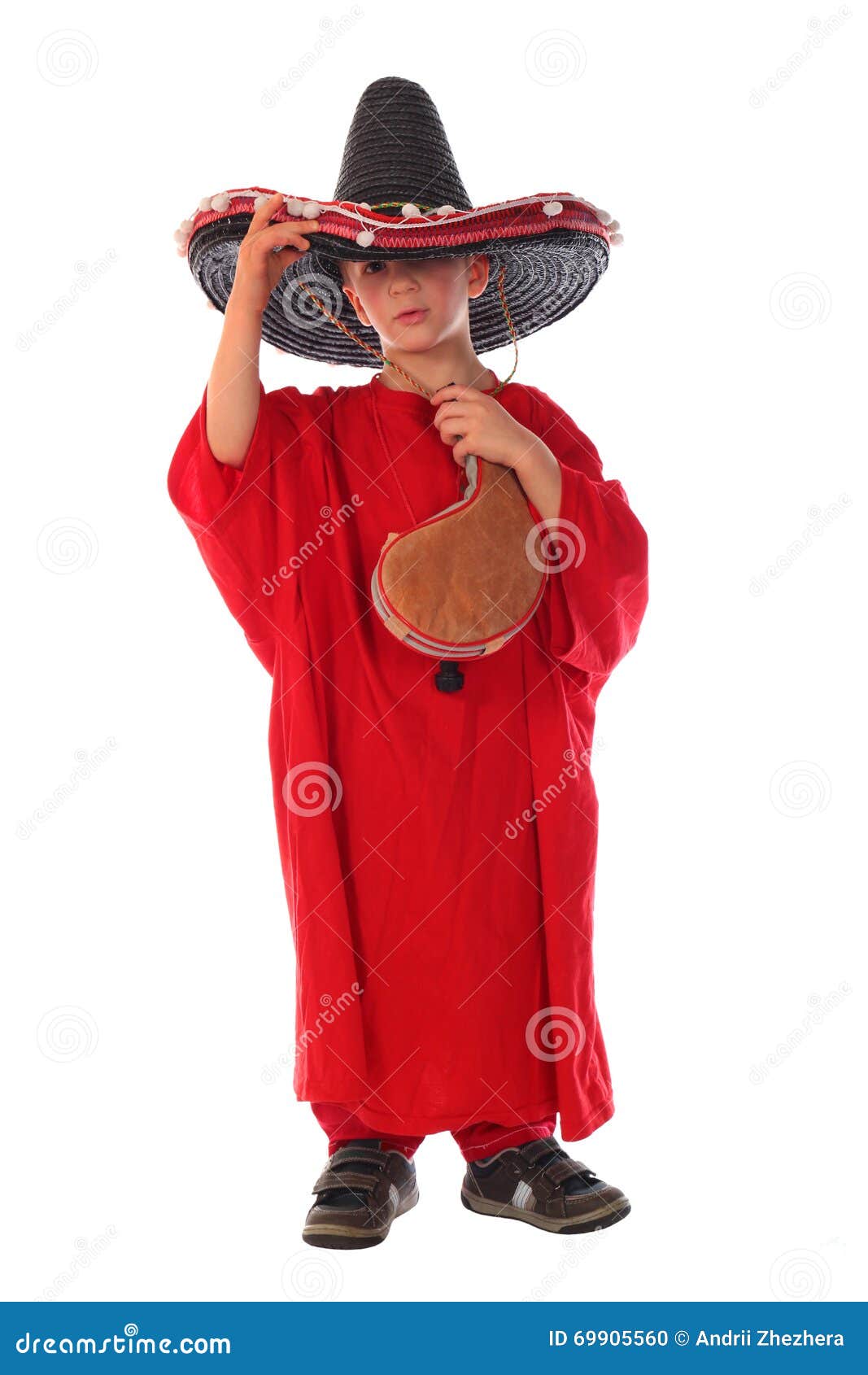 boy in spanish red shirt and sombrero holding bota bag with wine